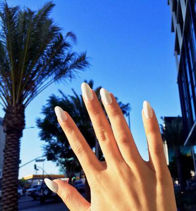 Andrea Brooks - Best known as YouTuber Andrea’s Choice, this beauty takes a break from filming to flex her opaque white mani in the California sunshine. (Photo: Andrea Brooks via Instagram)