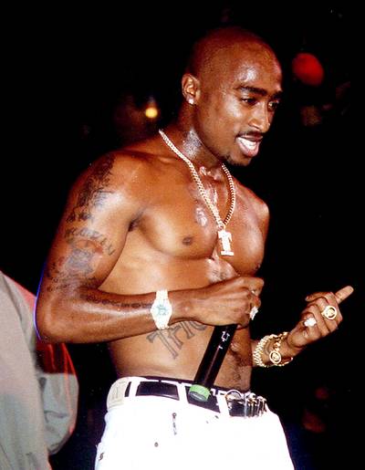 Tupac - Famously known for reppin' his West Coast set, Tupac was born in fly and flashy Harlem.  &nbsp;(Photo: WENN)