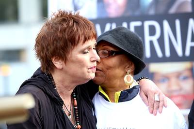 Poetry in Motion - Playwright Eve Ensler with the mother of Michelle Cusseaux, killed by Phoenix Police Department during a mental health crisis.&nbsp;&nbsp;(Photo: Andy Katz/Demotix/Corbis)