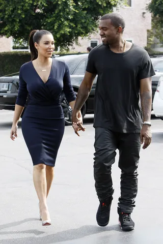Dashing Duo - Kanye West joins Kim Kardashian to the grand opening of DASH on Melrose in L.A. on Friday, July 13. The lovebirds arrived in their new muted sense of style.&nbsp;&nbsp;  (Photo: WENN.com)