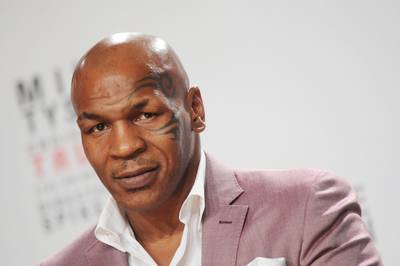 Mike Tyson on the taste of Evander Holyfield’s ear:&nbsp; - “It wasn’t too tasty… I didn’t have any of that Holyfield hot sauce on it. That would have been a delicacy.” (Photo: Landov)