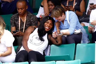 Serena Williams - A pregnant Serena Williams watched a tennis match from the bleachers at Roland Garros in Paris. (Photo: WENN)