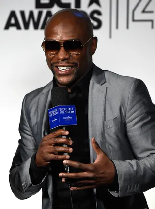 Money on the Mic - Floyd Mayweather Jr. hopped off the stage and dropped some words of wisdom during the live stream.  (Photo: Frazer Harrison/BET/Getty Images for BET)