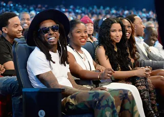One Big Happy Family - When Young Money comes together it's a family affair, literally speaking, since Wayne's daughter was there. But the crew really does look out for each other like a family. (Photo: Kevin Mazur/BET/Getty Images for BET)