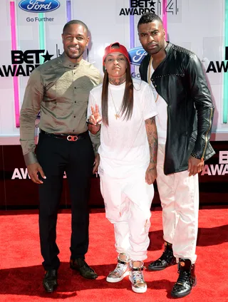 Tank, Siya and Ginuwine - The R&amp;B crooners pose with rapper Siya, who's rocking head-to-toe white. Ginuwine goes for some edge in Versace and black leather while Tank chooses a button-up.  (Photo: Earl Gibson III/Getty Images for BET)