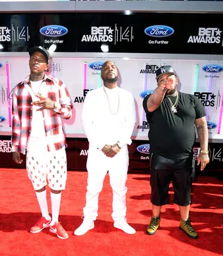 YG, Jeezy and DJ Mustard - The rap trio gets their style on. DJ Mustard and YG bring California cool while Jeezy fits right in with the all-white theme of the night.  (Photo: Earl Gibson III/Getty Images for BET)