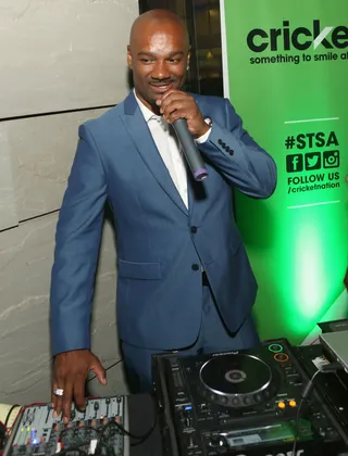 Mic Check - Big Tigger got behind the turntables and grabbed the microphone to make sure everybody was having a good time.&nbsp; (Photo: Jesse Grant/BET/Getty Images for BET)