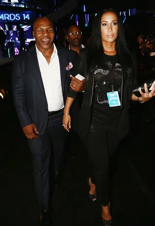Let's Get Ready to.... - Nope, no rumble. It's just Mike Tyson looking dapper as he enters the auditorium looking forward to a good show.(Photo: Johnny Nunez/BET/Getty Images for BET)
