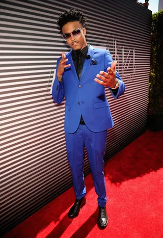 August Alsina - The R&amp;B crooner hits a high note in menswear, hitting the red carpet in a cobalt blue suit, leather tie and Balenciaga shoes. Loving his natural coils, too!  (Photo: Kevin Mazur/BET/Getty Images for BET)