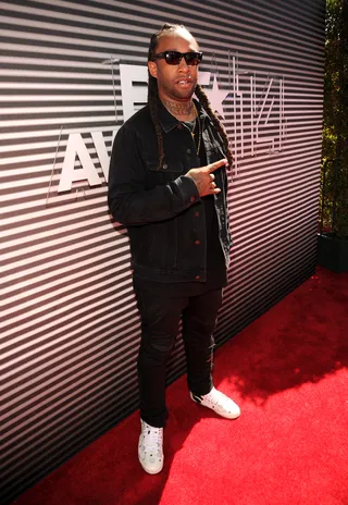 Ty Dolla $ign - The rapper takes it back to the '90s by adding a contemporary twist to a tailored denim suit.(Photo: Kevin Mazur/BET/Getty Images for BET)