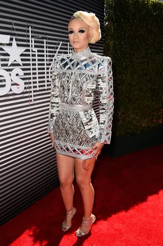 Charli Baltimore - The rapper-songwriter stuns in a futuristic metallic mini, adding a deep smokey eye and sculptural updo to take her look to another level. Hot!(Photo: Frazer Harrison/BET/Getty Images for BET)