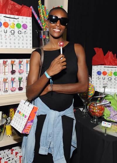 Zainab M. Johnson - The actress/comedienne&nbsp;is happy to pick up a red couture pop&nbsp;from The Sugar Factory. Johnson was a performer in the BET Experience's Comic View Live! show.&nbsp;(Photo: Angela Weiss/BET/Getty Images for BET)