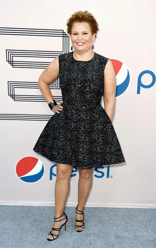 A Magical Evening - Before stepping inside the party, Lee hits the red carpet in a chic LBD and strappy sandals made for dancing.  (Photo: Frazer Harrison/BET/Getty Images for BET)