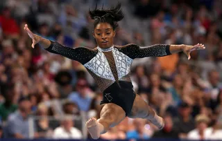 /content/dam/betcom/images/2021/06/News-06-16-06-30/062121-sports-simone-biles.jpg