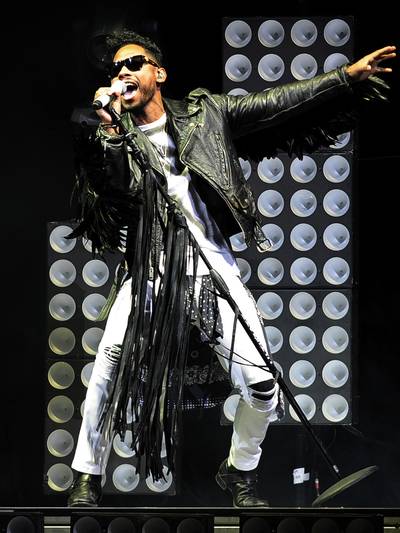 On the Fringe - Miguel rocks black leather and adorns his mic stand with the same during a live concert in Orlando, Florida.&nbsp;(Photo: WENN.com)