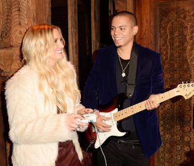Rock Out - Musician Evan Ross and his girflriend, actress/singer Ashlee Simpson, attend the BandFuse: Rock Legends video game launch event at House of Blues Sunset Strip in West Hollywood, California. (Photo: Jason Merritt/Getty Images for BandFuse: Rock Legends)