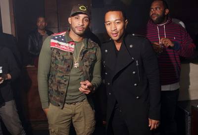 Cheers - John Legend celebrates with Hennessy V.S &nbsp;at Board Room in Chicago. The newly married, nine-time Grammy Award-winning singer is pictured here with famed local DJ Tone Kapone of the Hot Boyz. (Photo: Onasis/Hennessy)