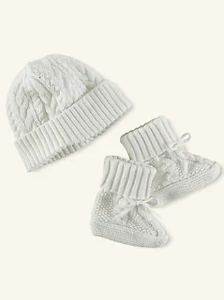 Ralph Lauren Lafayette Cabled Hat and Booties  - A newborn can never have too many cutesy cable knit accessories. This precious white set includes booties and a matching hat crafted from the softest cotton that’s conveniently machine washable.&nbsp;   (Photo: Ralph Lauren)