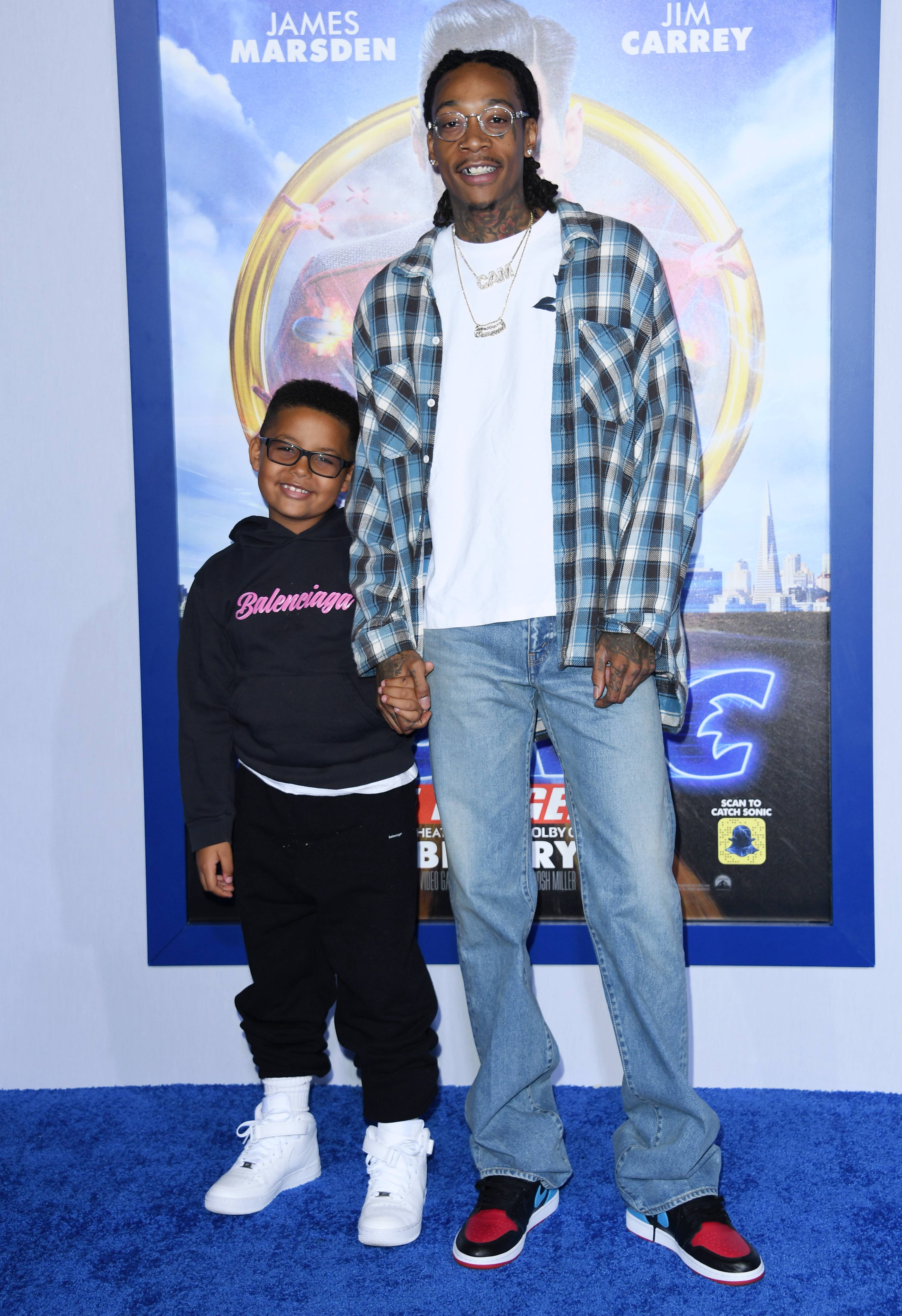 Wiz Khalifa And His Son Sebastian Wear Matching 7k Sneakers Posing In