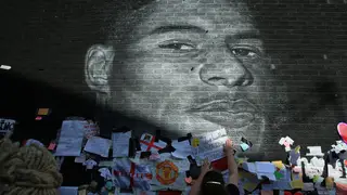 Messages of support adorn a mural of England forward Marcus Rashford after it was defaced on July 13, 2021 in Manchester, northwest England. - The mural was vandalised on July 12 after the England football team lost the UEFA Euro 2020 final. (Photo by Lindsey Parnaby / AFP) (Photo by LINDSEY PARNABY/AFP via Getty Images)