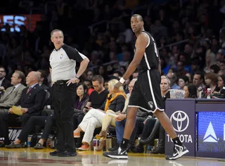 Jason Collins Says Hello Brooklyn - Jason Collins is back on the court. The first openly gay active player in NBA became the first gay player in the NBA when he&nbsp;signed a 10-day contract&nbsp;with the Brooklyn Nets.&nbsp; He&nbsp;appeared in his first game in nine months&nbsp;on Sunday when the Nets played the Lakers in Los Angeles.&nbsp;(Photo: Mark J. Terrill/AP Photo)