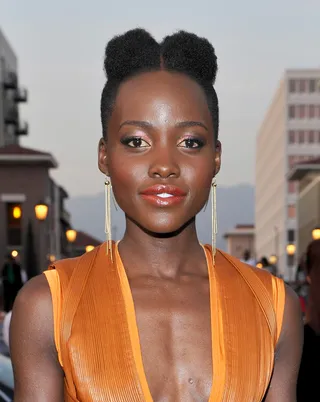 Lupita's Poufs  - We didn’t know pigtail poufs were possible until we spied them on Lupita at the NAACP Image Awards and instantly fell in love.  (Photo:&nbsp;Frederick M. Brown/Getty Images for NAACP Image Awards)