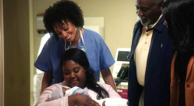 A New Patterson Enters the World - The Pattersons gather around to welcome little Isabelle to the clan. (Photo: BET)
