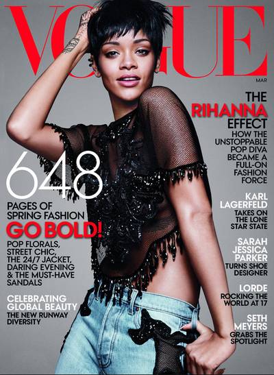 Rihanna  - The superstar graces the fashion bible’s March 2014 cover, her third appearance, and is the picture of high fashion in her sheer, beaded top and ripped denim. Inside, the singer dishes about everything from hair to her secret obsession with “fake jewelry.”  (Photo: Vogue Magazine, March 2014)