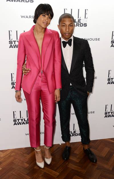 Man of Style - Pharrell Williams and wife Helen Lasichanh make a striking pair as they arrive at the 2014 British Elle Style Awards at One Embankment in London. (Photo: Ian Gavan/Getty Images)