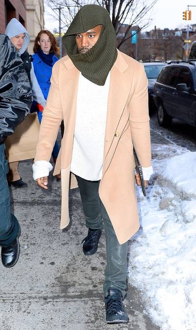 #WayTooCold - Kanye West&nbsp;is bundled up as he leaves a NYC fashion design studio, where he and his friend, designer Virgil Abloh, were working on some new gear. Yeezy's bodyguard was later seen carrying samples of the line.&nbsp;(Photo: 247PapsTV / Splash News)