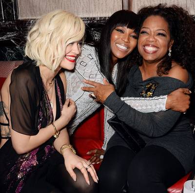 2 Brit Chix and an American Girl - Rita Ora, Naomi Campbell&nbsp;and&nbsp;Oprah Winfrey share a laugh at the Weinstein Co. post-BAFTA party hosted by Bulgari and Grey Goose at Rosewood London in London. (Photo: David M. Benett/Getty Images for The Weinstein Company)