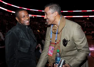 What's So Funny, Rick? - Chris Tucker gets a laugh out of former NBA player Rick Fox behind the scenes at The Smoothie King Center on Saturday night.  (Photo: Kevin Mazur/WireImage)