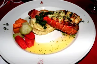 Decadent Dining - Be sure to indulge in an evening of decadent dining at the Sunset Restaurant. Give the grilled lobster drizzled with garlic butter sauce a try. It’s phenomenal.   (Photo: Metanoya Z. Webb/BET)