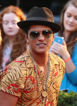 Bruno Mars @brunomars - Tweet: &quot;WE'RE GOING TO THE SUPER BOWL!!!!!!! #PepsiSBHalftime&quot;Bruno Mars celebrates the news that he will be the headliner performing at the 2014 Super Bowl.(Photo: Scott Barbour/Getty Images)