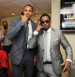 Pick Up the Phone - New York Knicks star Carmelo Anthony and Diddy attend the annual charity day hosted by Cantor Fitzgerald and BGC at the BGC in New York City. The group raised $12 million for their September 11 fund.&nbsp;&nbsp;(Photo: Jamie McCarthy/Getty Images for Cantor Fitzgerald)