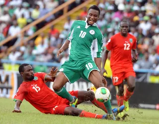 Nigeria - Nigeria earned a spot in the playoffs on Sept. 7 when the Super Eagles cinched a 2-0 victory over Malawi. Striker Emmanuel Emenika and attacker Victor Moses landed the winning shots.  (Photo: PIUS UTOMI EKPEI/AFP/Getty Images)