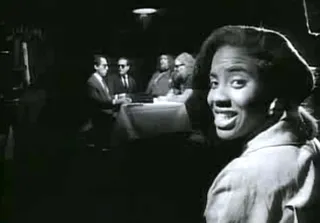 &quot;Cappuccino&quot; - Lyte proved her story-telling abilities on this cautionary (and fictional) cut. While buying her favorite caffeinated beverage she becomes an innocent bystander in a drug-related shootout. Her point: whether coffee or cocaine, drugs are affecting everybody. &nbsp;(Photo: Atlantic Records)