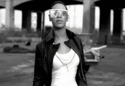 &quot;Diva&quot; - Sasha Fierce made an appearance in the &quot;Diva&quot; music video wearing faded jeans, a tight white tee topped with a leather jacket and those over-the-top tassle shades.  (Photo: Sony Music)