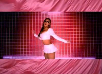 &quot;Check On It&quot; - It was only fitting for Beyoncé to go heavy on the pink for this song from&nbsp;The Pink Panther&nbsp;soundtrack. The fun video features the singer in 12 different outfits, including this flirty, pink tennis skirt, fitted crop top with flared sleeves and braids.  (Photo: Sony Music)