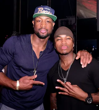 Good Times - Miami Heat captain Dwyane Wade and Ne-Yo get their cool pose on at D-Wade's teammate Chris Bosh's 29th birthday celebration at Bamboo in Miami Beach. (Photo: Johnny Louis/WENN.com)