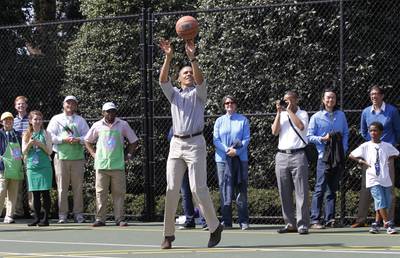 A Jump Shot - At the 2013 White House Easter Egg Roll, Obama made just 2 of of the 22 shots he took on the basketball court. If there really is a Santa, maybe he'll bring the president some game. (Photo: REUTERS/Jason Reed)