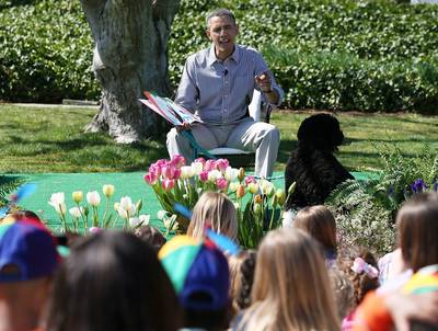 Story Time 2 - Obama, with Bo at his side, reads Chicka Chicka Boom Boom to his young guests.(Photo: Mark Wilson/Getty Images)