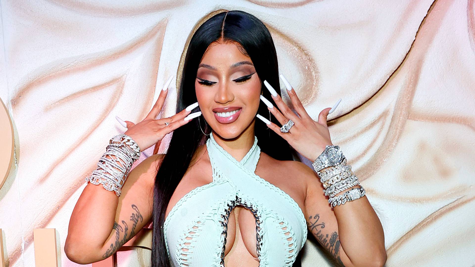 Cardi B Shows Off Peacock Hip Tattoo After 'Hours of Pain