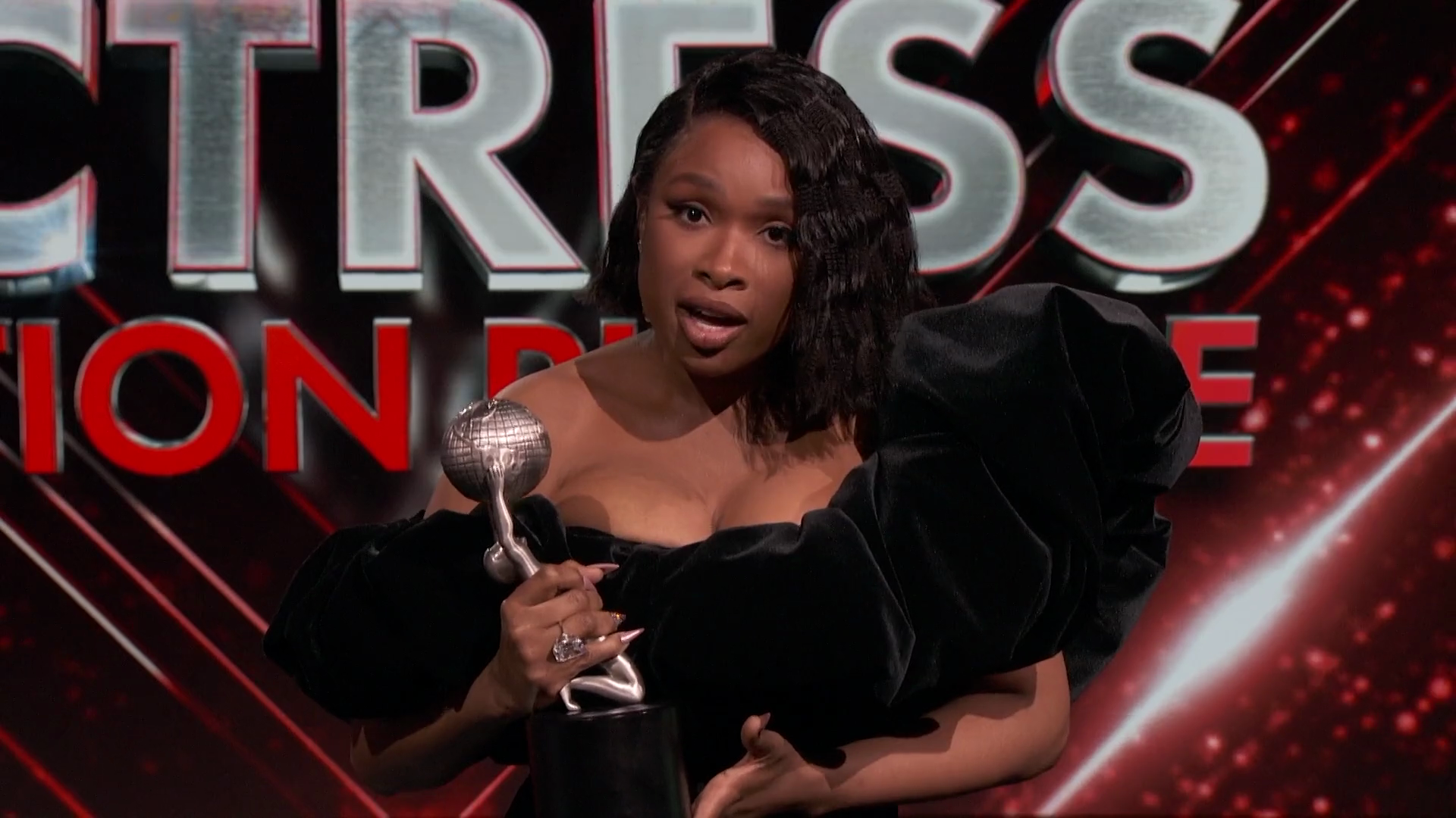 Jennifer Hudson dedicates her award to the family of the late Aretha Franklin as she accepts the trophy for Outstanding Actress in a Motion Picture for her role in "Respect."