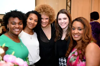 Knowledge Is Power - Writer and activist Michaela Angela Davis shares a group hug with local college students.&nbsp;(Photo: Phelan Marc/BET)