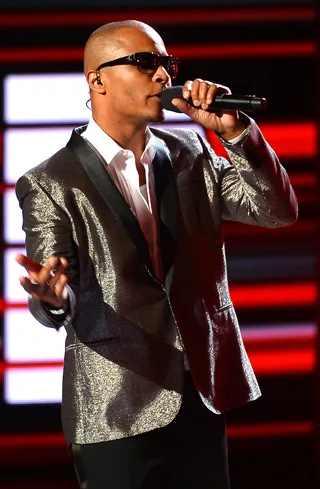 T.I. - T.I.&nbsp;is vying for Hustler of the Year and what else would you expect from a proven vet who touts Grand Hustle as his label and Hustle Gang as his crew? It's only right, right? Besides bolstering his music crew, Tip has also continued with his VH1 reality show. Now that's some paperwork.(Photo: Mark Davis/Getty Images for BET)