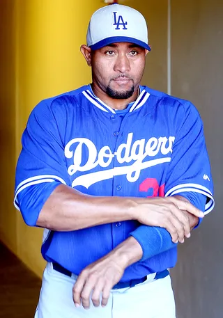 Dodgers Release Olivo After Ear-Biting Incident - The Los Angeles Dodgers released catcher Miguel Olivo from their Triple-A team Thursday for biting a piece of teammate Alex Guerrero’s ear off during a dugout fight Tuesday.&nbsp;(Photo: Christian Petersen/Getty Images)