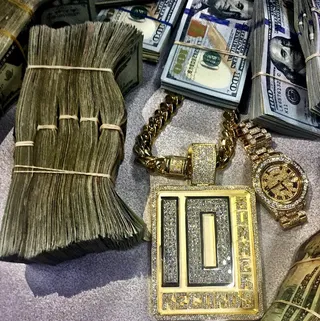 Cash Money - "I just found a 100 in my pants pocket / Never carry cash 'cause it don't fit in my damn wallet / Got an 'F' in school, but I made an 'A' for flashy / Whatchu make a year, thats what I gotta pay for taxes" — "Rich Problems" (Photo: DJ Mustard via Instagram)