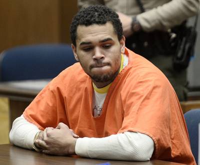 WORST: Chris Brown's Incarceration - The law finally caught up with Breezy this year. After a judge ruled his attack on a man in front of a Washington, DC hotel constituted a violation of his probation from his Rihanna domestic violence case, Brown was sentenced to jail time in March. The singer remained behind bars for more than half of the year. (Photo: Paul Buck-Pool\Getty Images)
