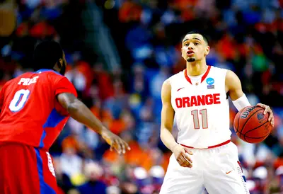12. Orlando Magic—Tyler Ennis (Syracuse) - Can you say pure point guard? Tyler Ennis was just that for Syracuse this year, looking to create first, but also flashed a stellar shooting prowess with three-point range. Orlando leaving the June 26 Draft with Ennis and Randle would be Magic.(Photo: Jared Wickerham/Getty Images)